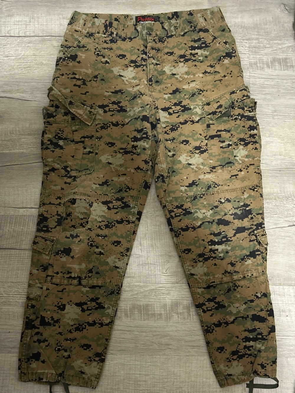 Prestige Tactical Wear camouflage trousers. 41 In Length, 34 Inch Waist.